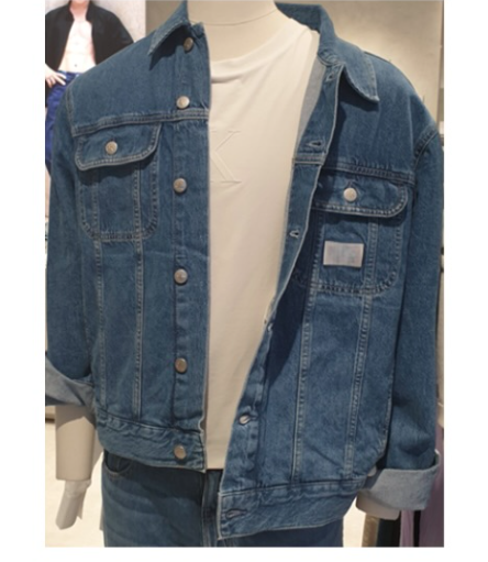 A blue denim jacket pictured on a mannequin