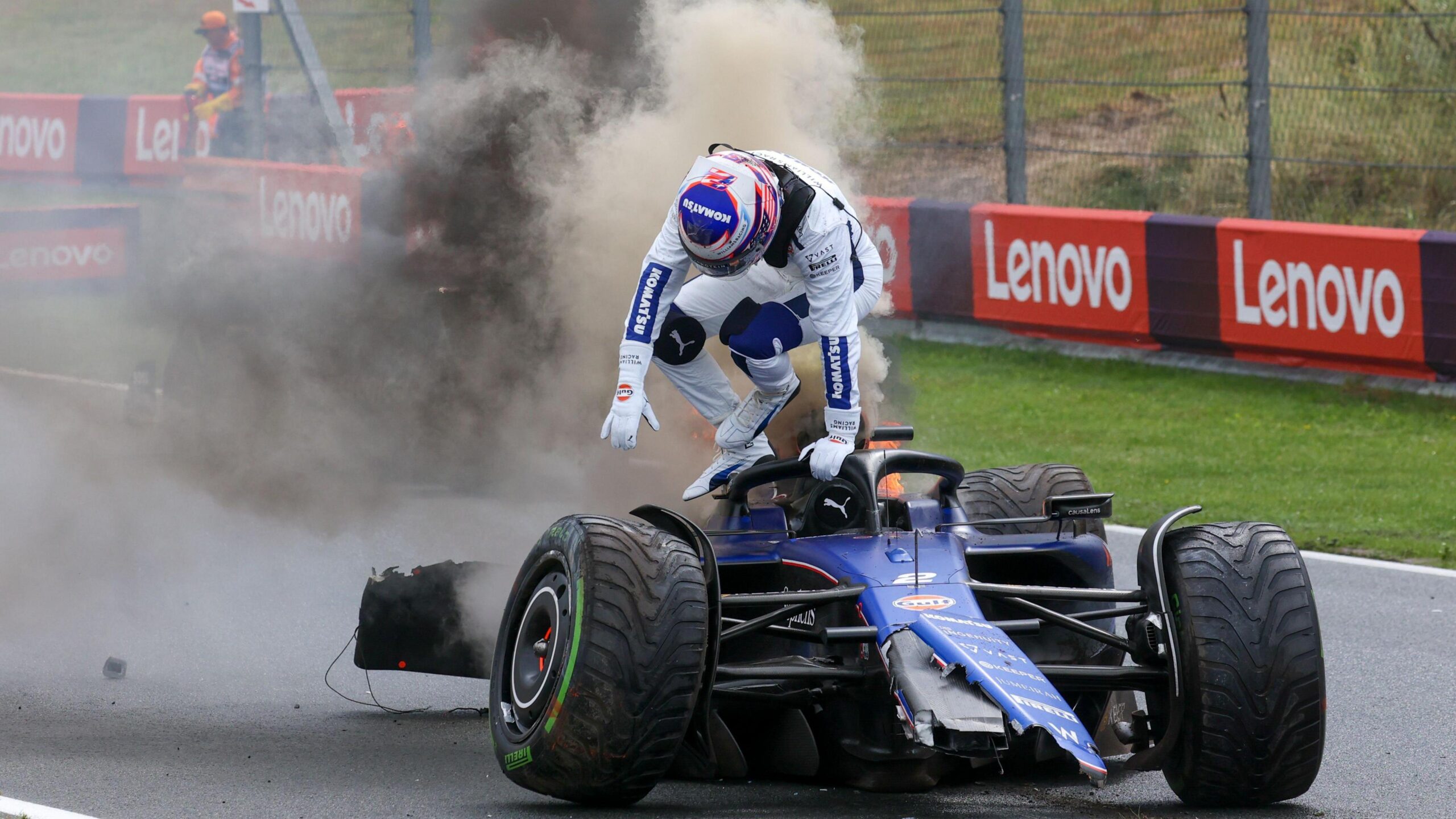 Logan Sargeant jumps out of his smoking Williams after crashed in final practice, causing extensive damage which meant he was unable to take part in qualifying. He was dropped by Williams the following week