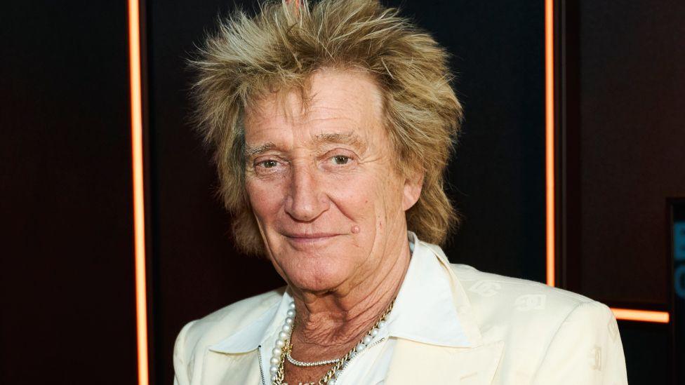 Rod Stewart pictured in the BBC Radio 2 studio in 2025, wearing a white shirt