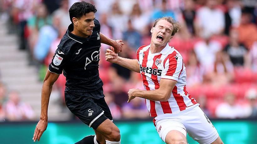 Marko Stamenic competes with Stoke's Svante Ingelsson last weekend