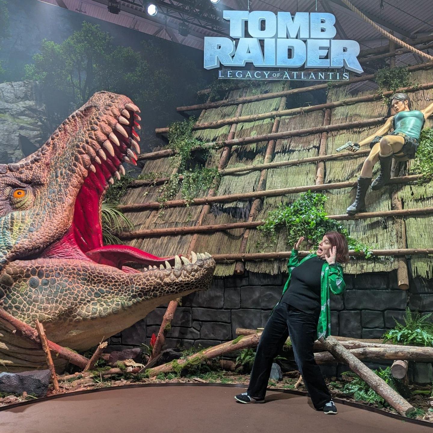 A giant creature opens its mouth in the Tomb Raider: Legacy of Atlantis booth of the expo