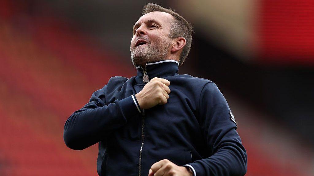 Nathan Jones pumps his chest