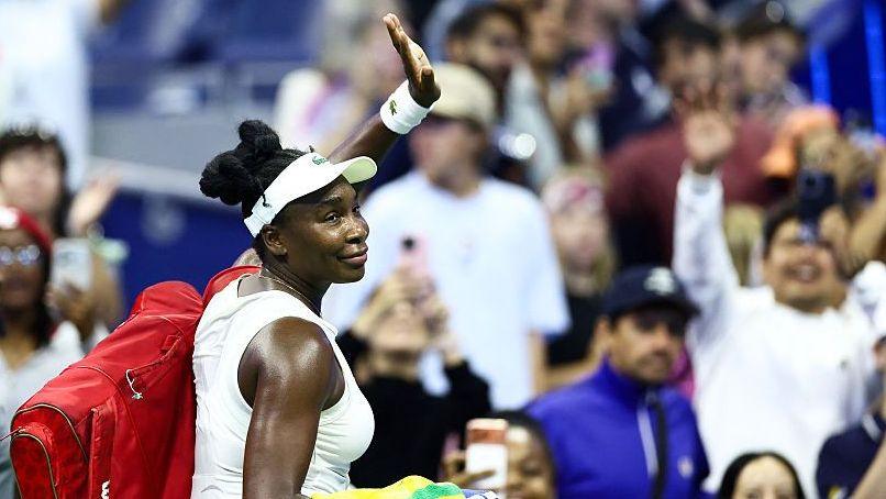 Venus Williams waves to the crowd as she exits Arthur Ashe Stadium following her defeat by Sofia Kenin in the first round of the 2026 US Open in Flushing Meadows, New York