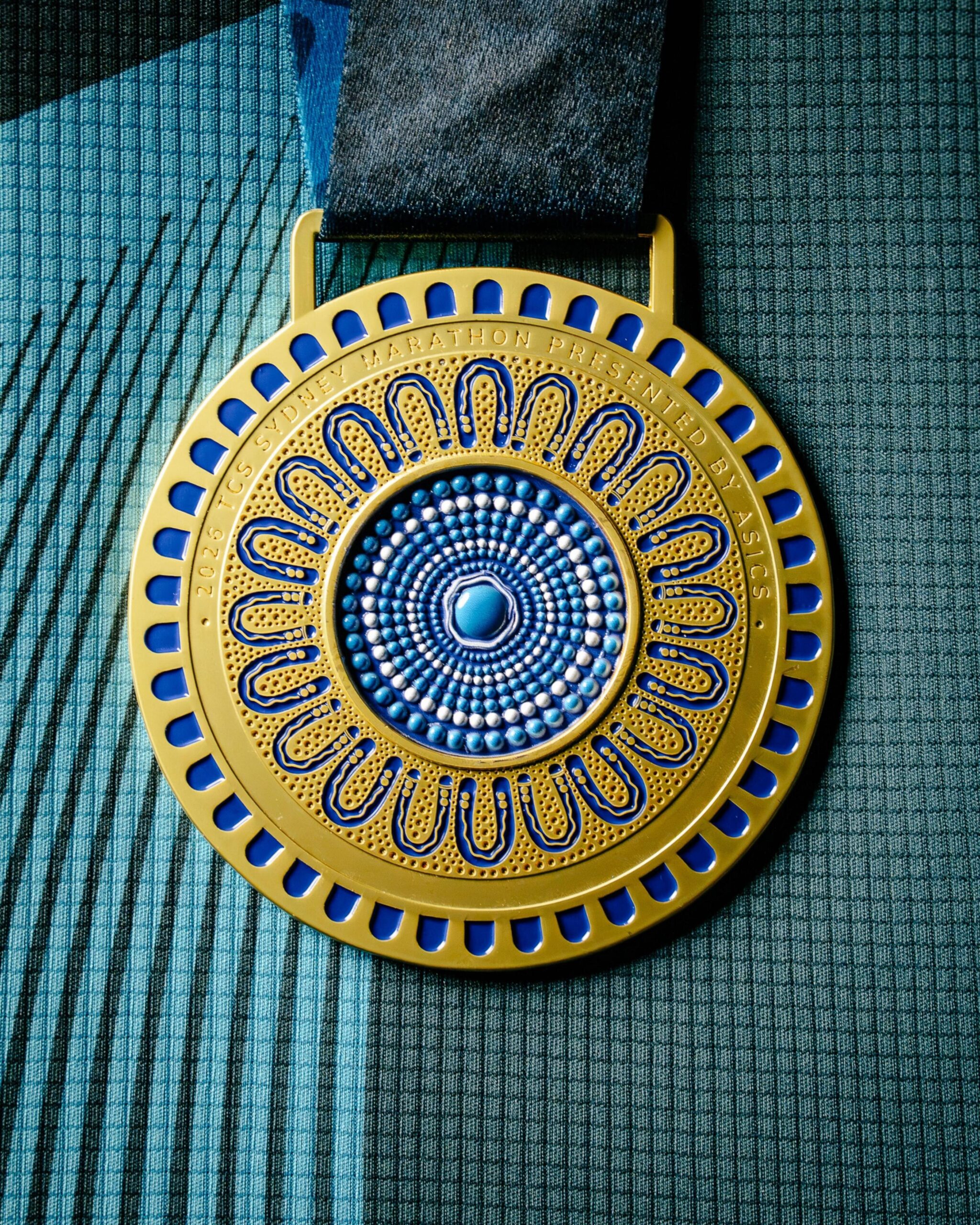 Front of the Sydney Marathon medal.