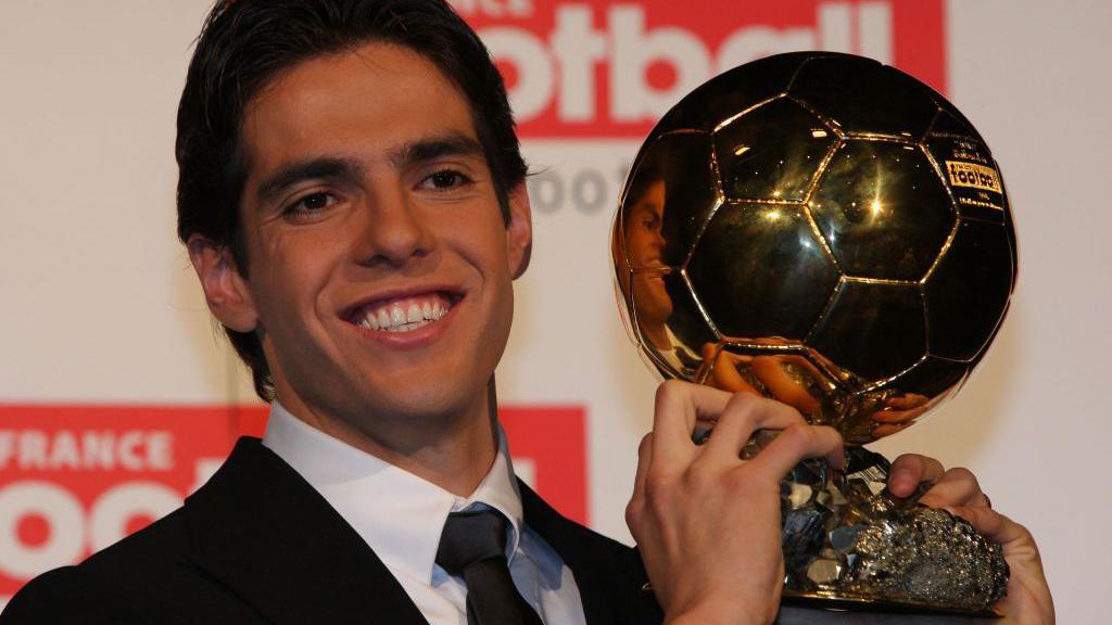 Kaka holding the Ballon d'Or trophy
