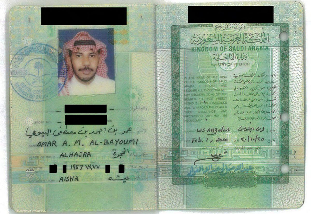 Omar al-Bayoumi's passport shows him in a Saudi red-and-white headscarf called a shemagh.