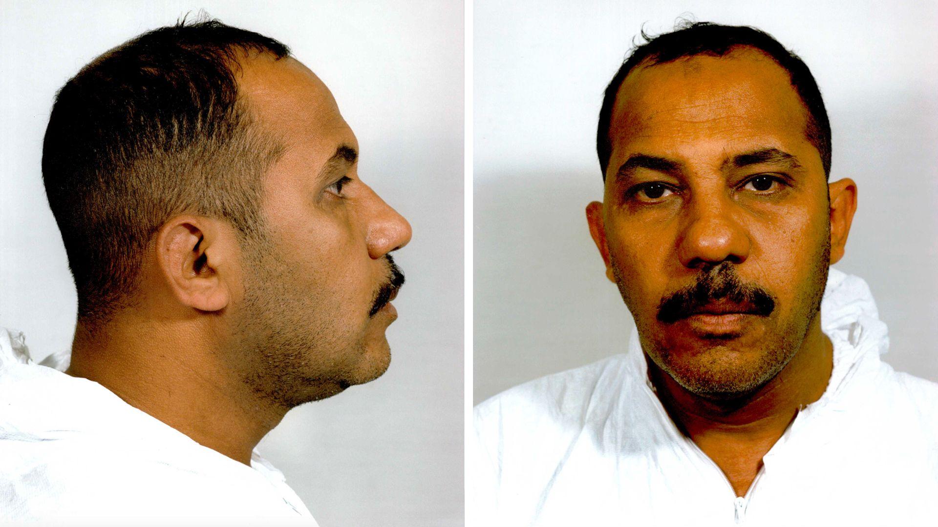 Mugshots of Omar al-Bayoumi show him in white overalls.