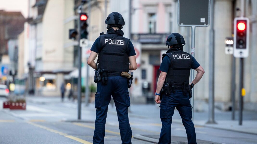 Manhunt after one killed and five injured in Swiss shooting, police say Manhunt after one killed and five injured in Swiss shooting, police say