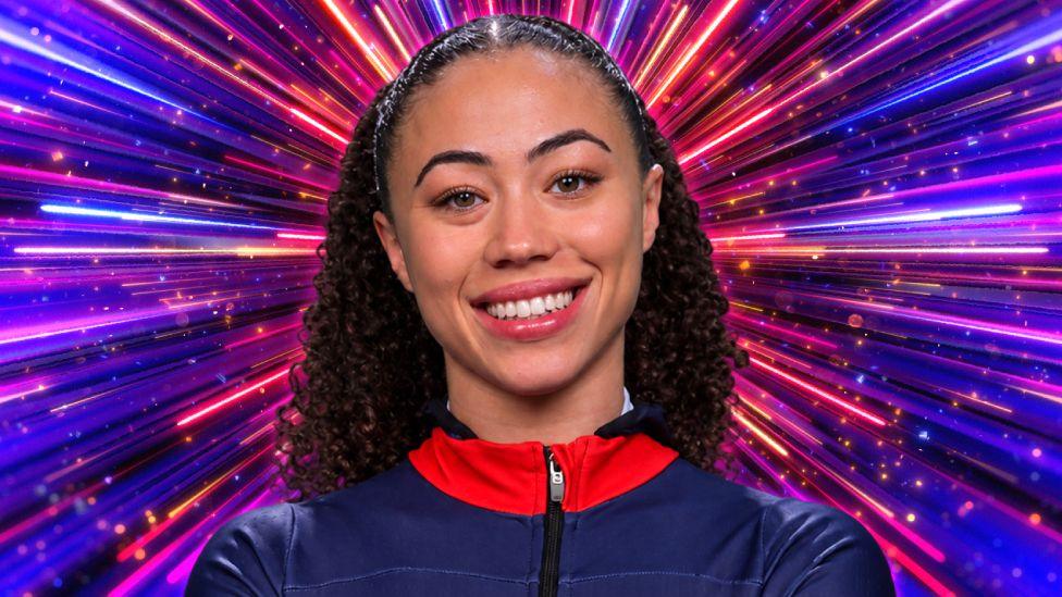 Tabby Stoecker pictured in front of the pink and purple Strictly Come Dancing background