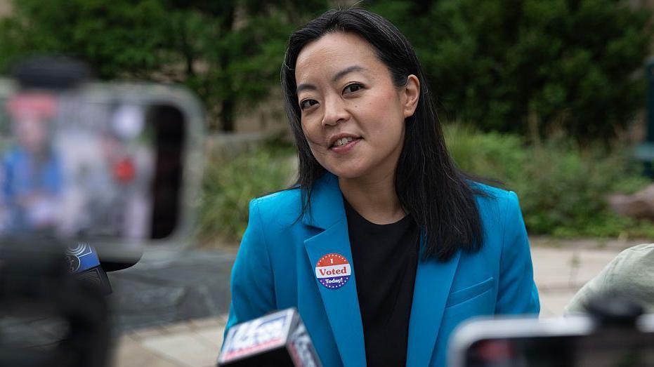 Democratic Wisconsin governor candidate Francesca Hong speaks to reporters