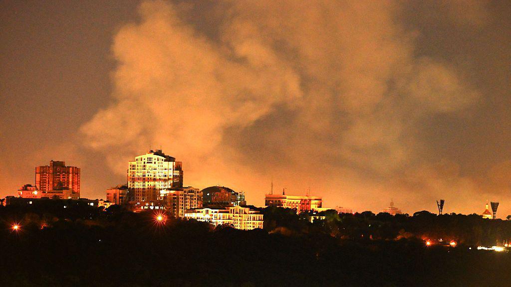 View of smoke rising from the site of damaged buildings in Kyiv.