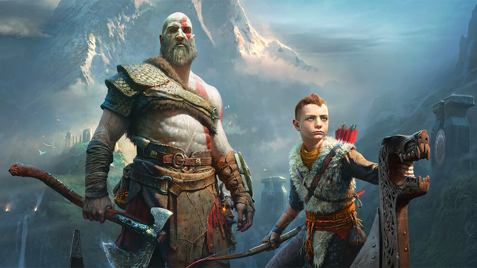 The cover image of 2018's God of War shows main character Kratos wearing leather armour and holding a large axe by his side. His son, Atreus, stands next to him, holding a bow in one hand and using the other to grip the dragon carving on the bow of a Viking rowing boat. A foreboding, snow-covered mountain looms over the pair in the background.