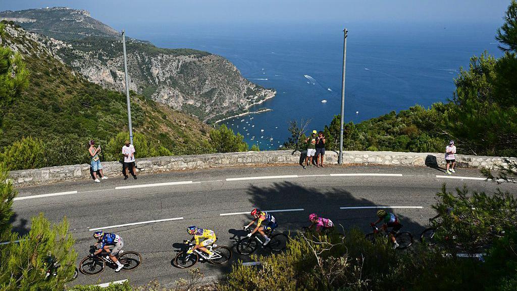 Riders climb by the coast during the final stage of the 2026 Tour de France Femmes