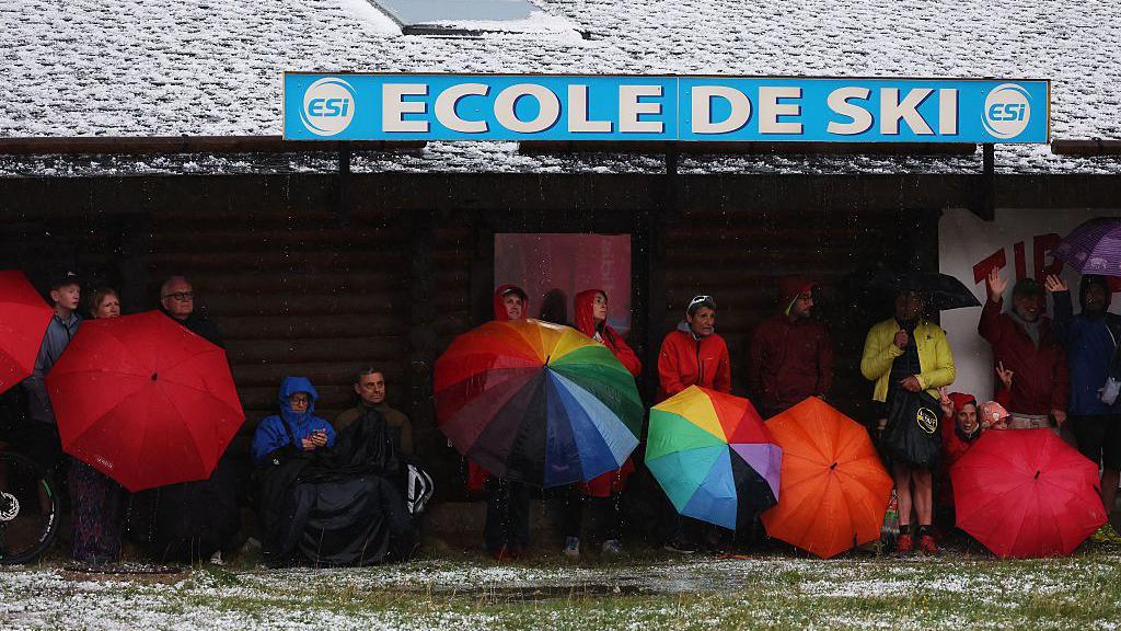 Spectators seek shelter