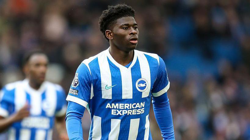 Brighton midfielder Carlos Baleba in action against Manchester United on the final day of last season
