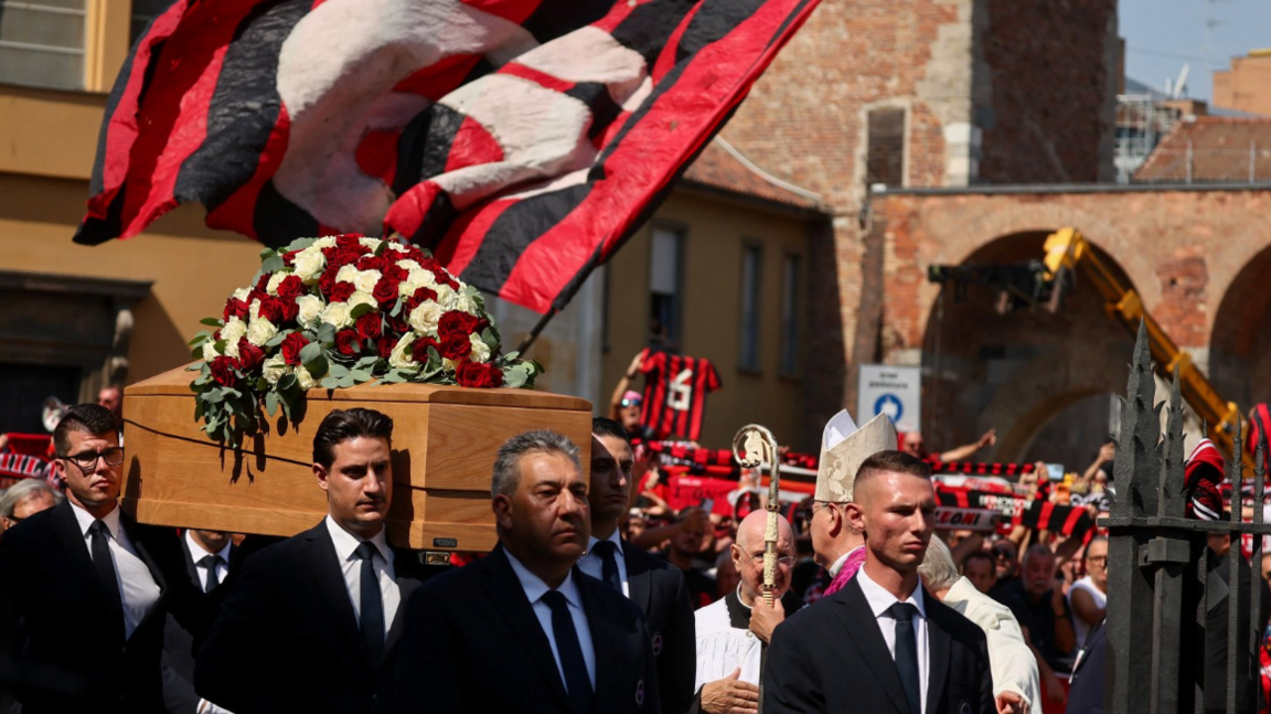 Pallbearers carry the coffin outside the Basilica of Sant'Ambrogio during the funeral of former AC Milan and Italy soccer player Franco Baresi