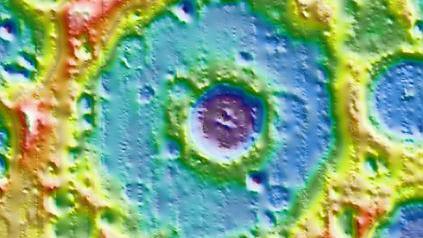 The Einstein crater, seen in a colourful image, with a smaller crater within