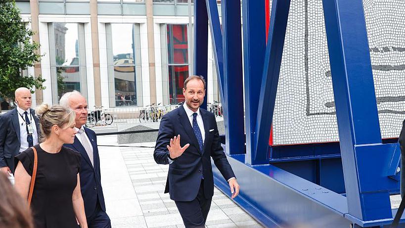 Crown Prince Haakon of Norway gestures to a crowd. Photo: July 2026
