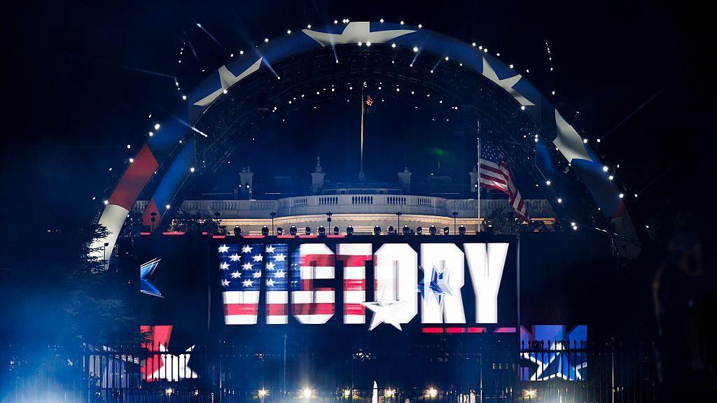 A victory message is projected after Justin Gaethje defeats Ilia Topuria in a lightweight title bout during UFC Freedom 250 on the South Lawn of the White Hous