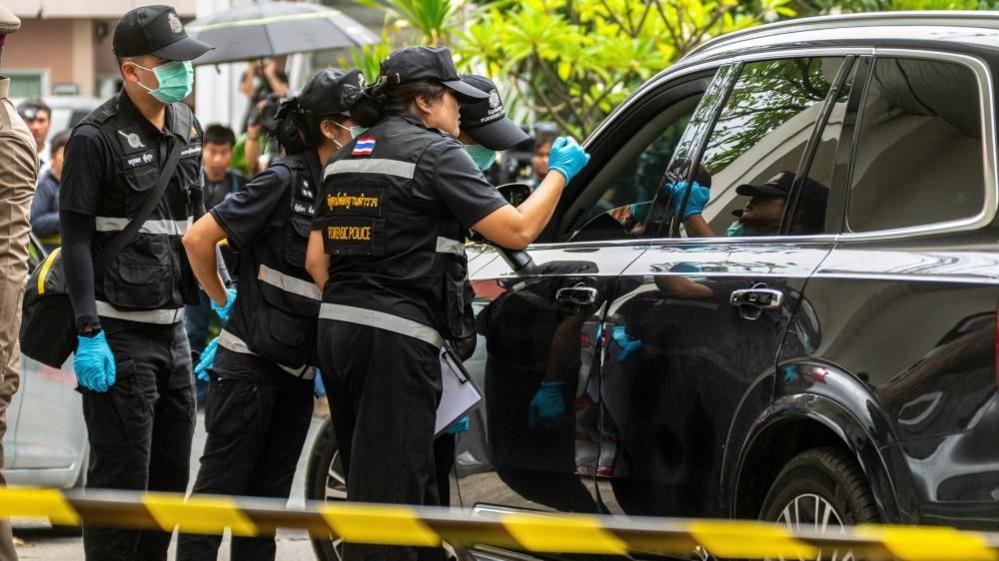 Forensic police officers inspect the site of a shooting after former lawmaker Chalong Riewrang allegedly shot Thongchai Yenprasert, president of the Nonthaburi Provincial Administrative Organisation, in Nonthaburi province, on the outskirts of Bangkok, Thailand, August 10, 2026
