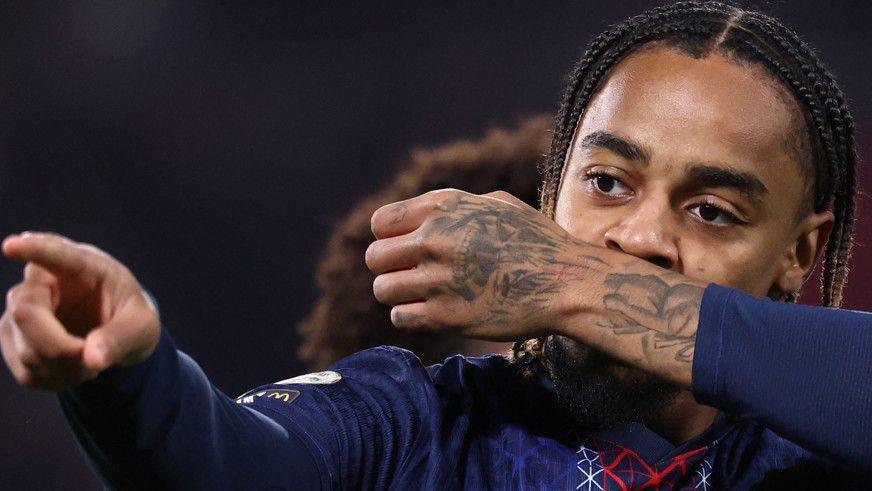 Paris Saint-Germain's Bradley Barcola celebrates after scoring his side's first goal during the Ligue 1 match against Strasbourg on October 17, 2025