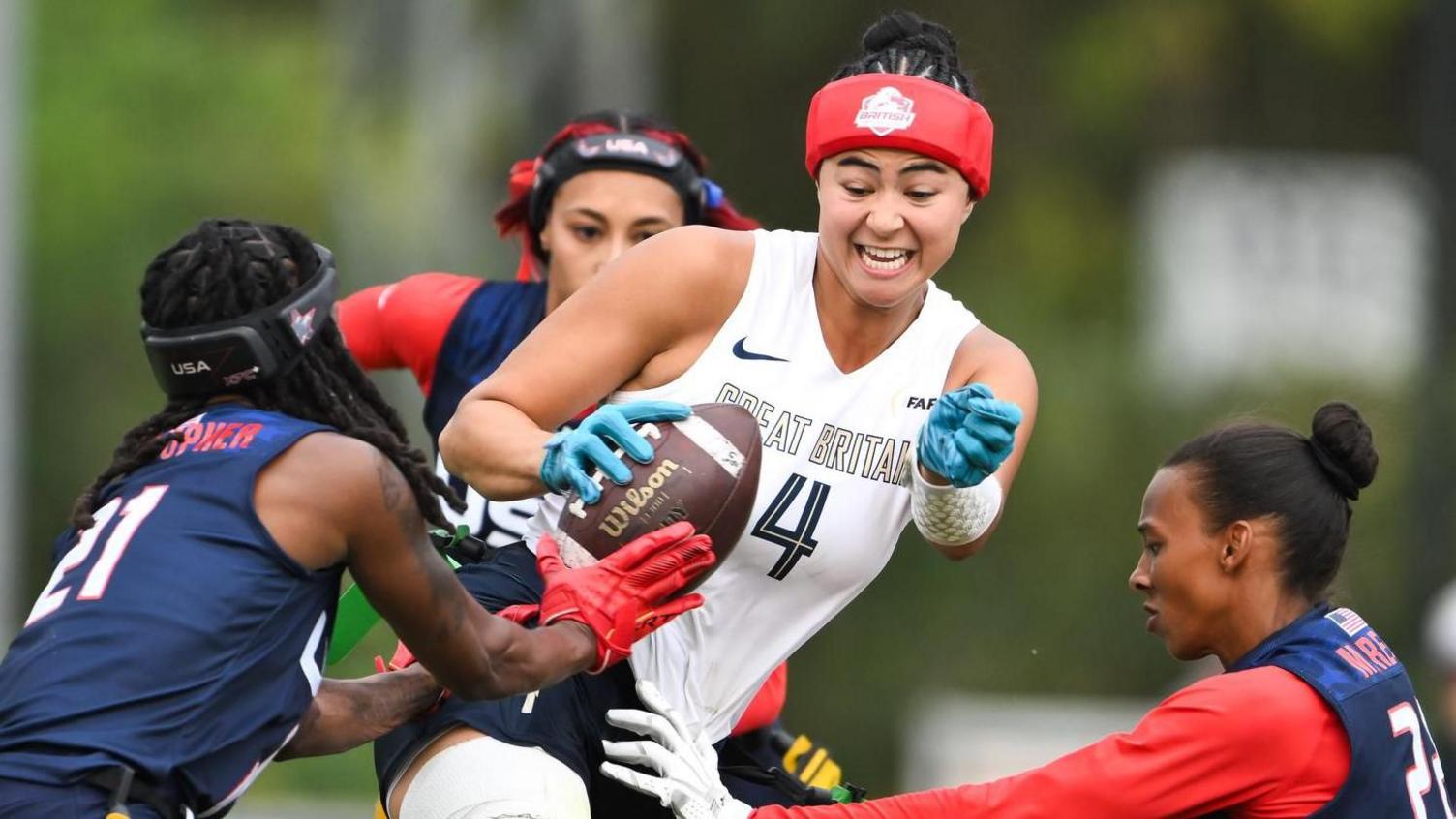 Angelica Tait is tackled during Great Britain's semi-final defeat by the USA at the 2026 Flag Football World Championships