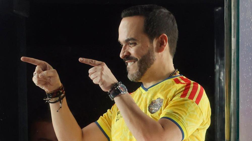 Colombian presidential candidate Abelardo de la Espriella greets supporters following preliminary results that show him leading leftist Ivan Cepeda, in Barranquilla, Colombia, 21 June 2026.
