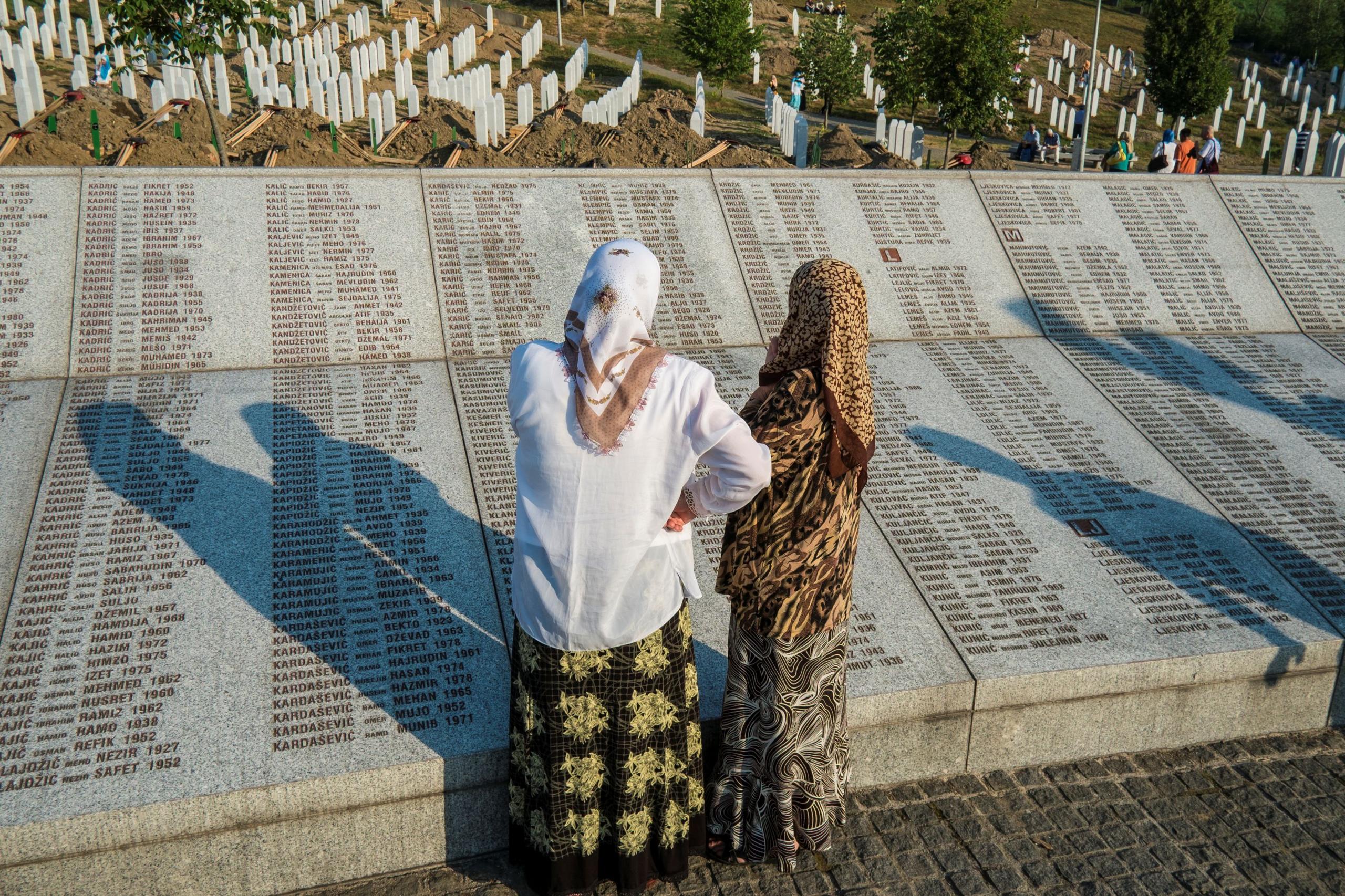 Srebrenica-Potocari Memorial and Cemetery, Muslim women read names of victims of the July 1995 Srebrenica massacre, carried out by Bosnian Serb forces led by then General Ratko Mladic, photo taken in 2012