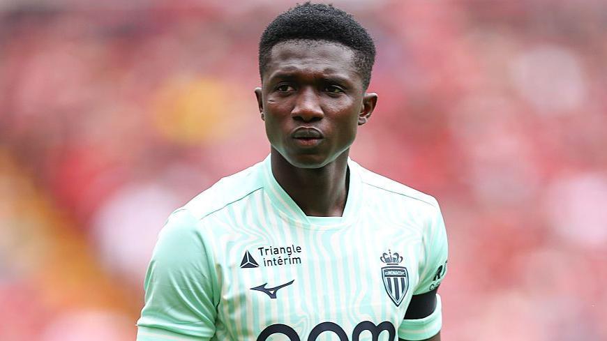 Lamine Camara looking just off camera while playing for Monaco