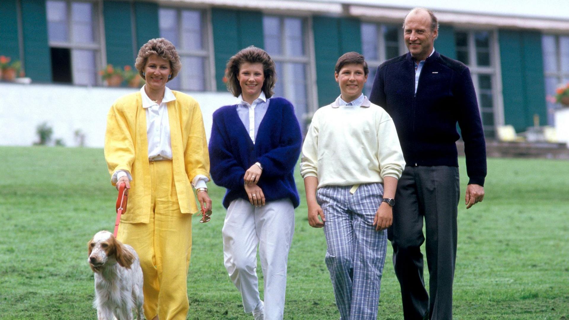The Crown Prince family (L-R) Crown Princess Sonja, Princess Martha Louise, Prince Haakon Magnus and Crown Prince Harald with the dog on a walk in the garden at Skaugum royal palace in Asker, Norway, in 1987