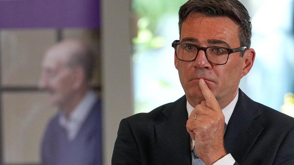 Prime Minister Andy Burnham looking thoughtful