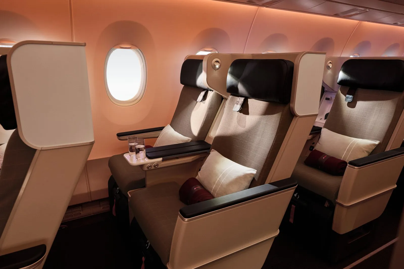 Image may contain Aircraft Airplane Transportation Vehicle Cushion Home Decor and Airplane Cabin