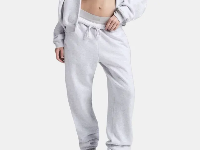 model wearing grey jogger pants