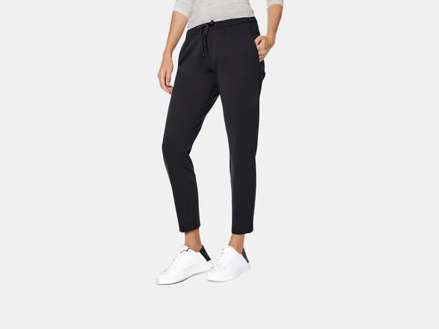 Image may contain: Clothing, Pants, Person, Jeans, Footwear, Shoe, and Sneaker