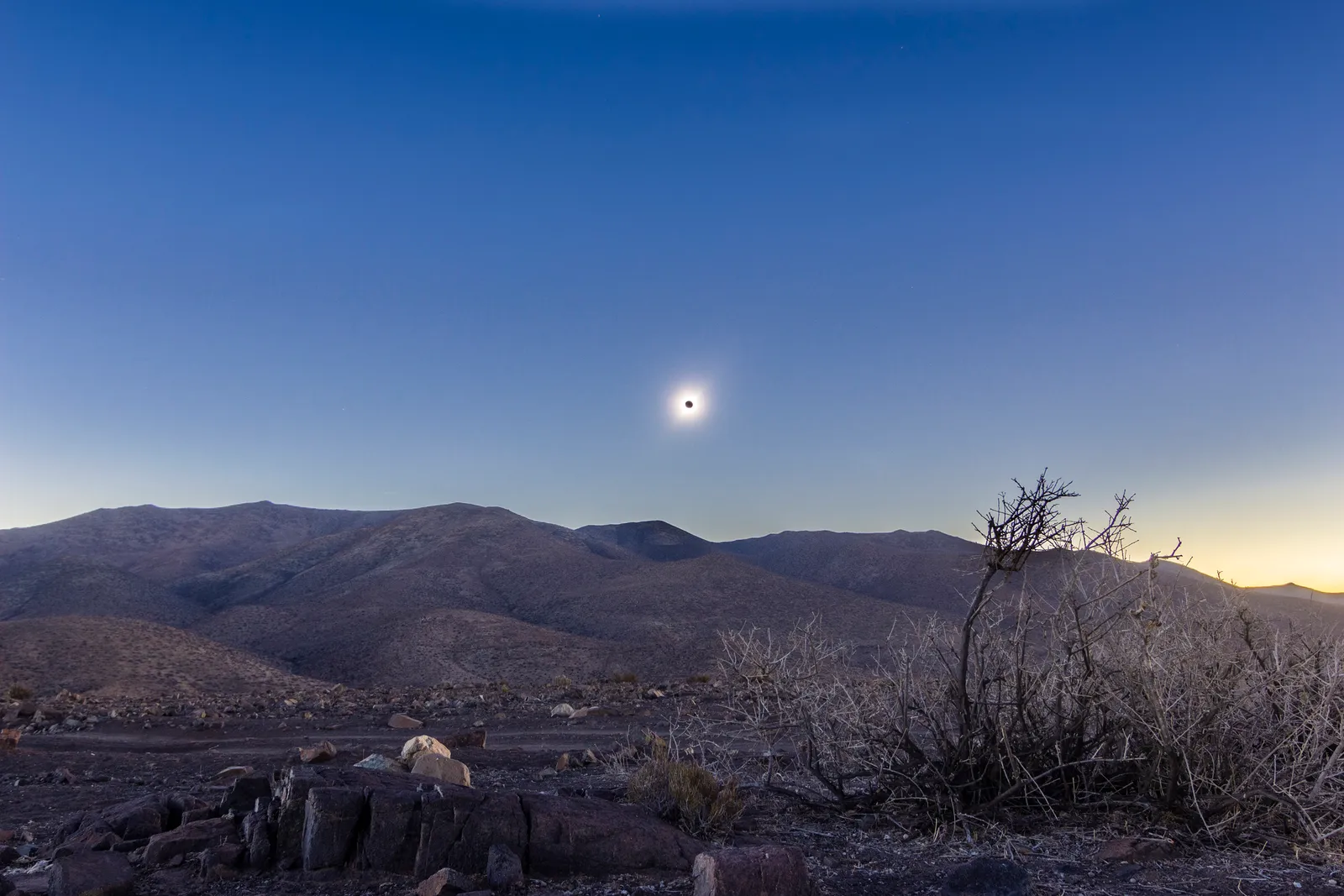Image may contain Nature Night Outdoors Wilderness Rock Astronomy Moon Sky Mountain Mountain Range and Peak