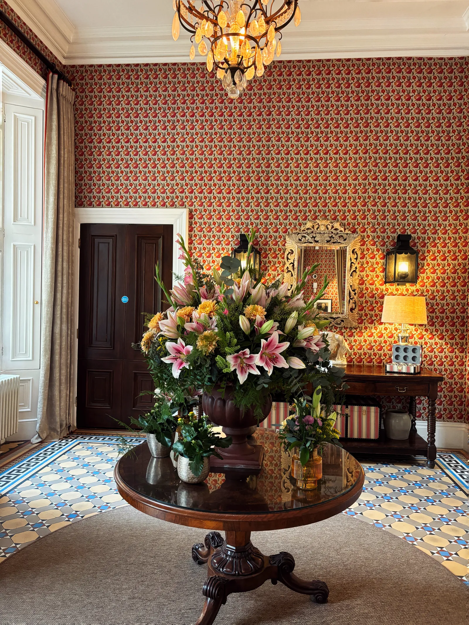 Image may contain Flower Flower Arrangement Plant Flower Bouquet Chandelier Lamp Home Decor and Indoors