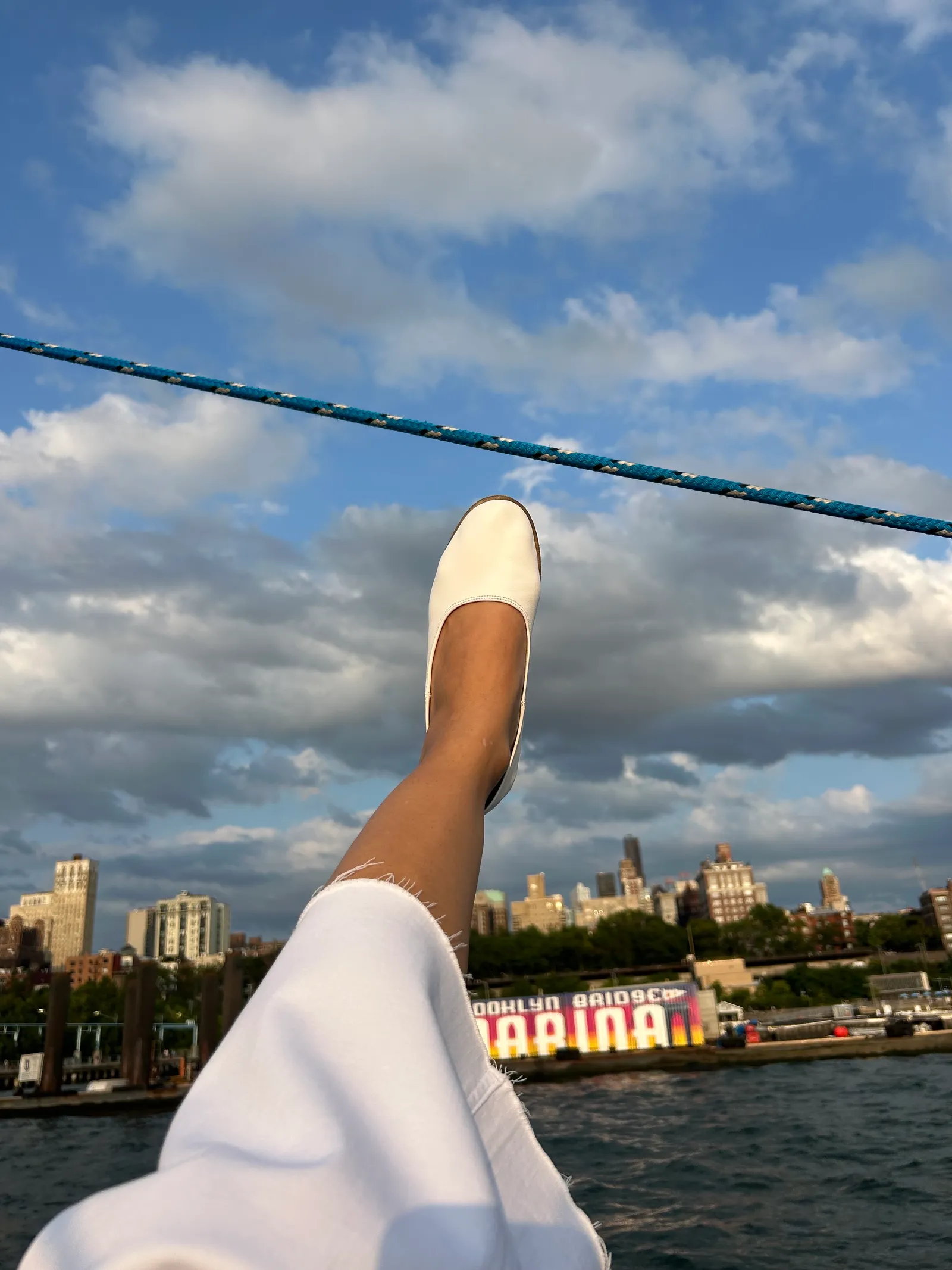Image may contain City Urban Clothing Footwear Shoe Arm Body Part Person and Adult