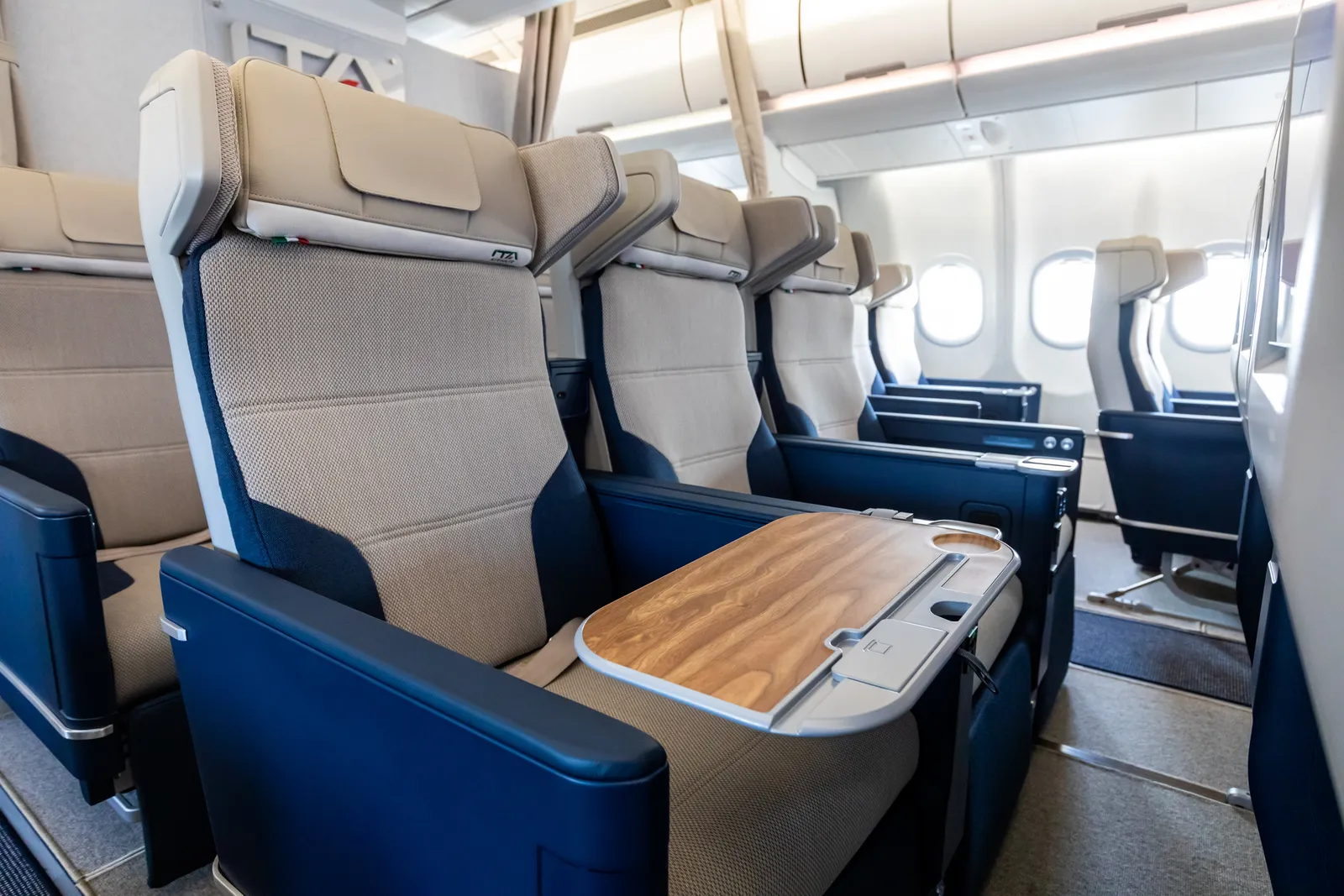 Image may contain Aircraft Airplane Transportation Vehicle Airplane Cabin Chair and Furniture