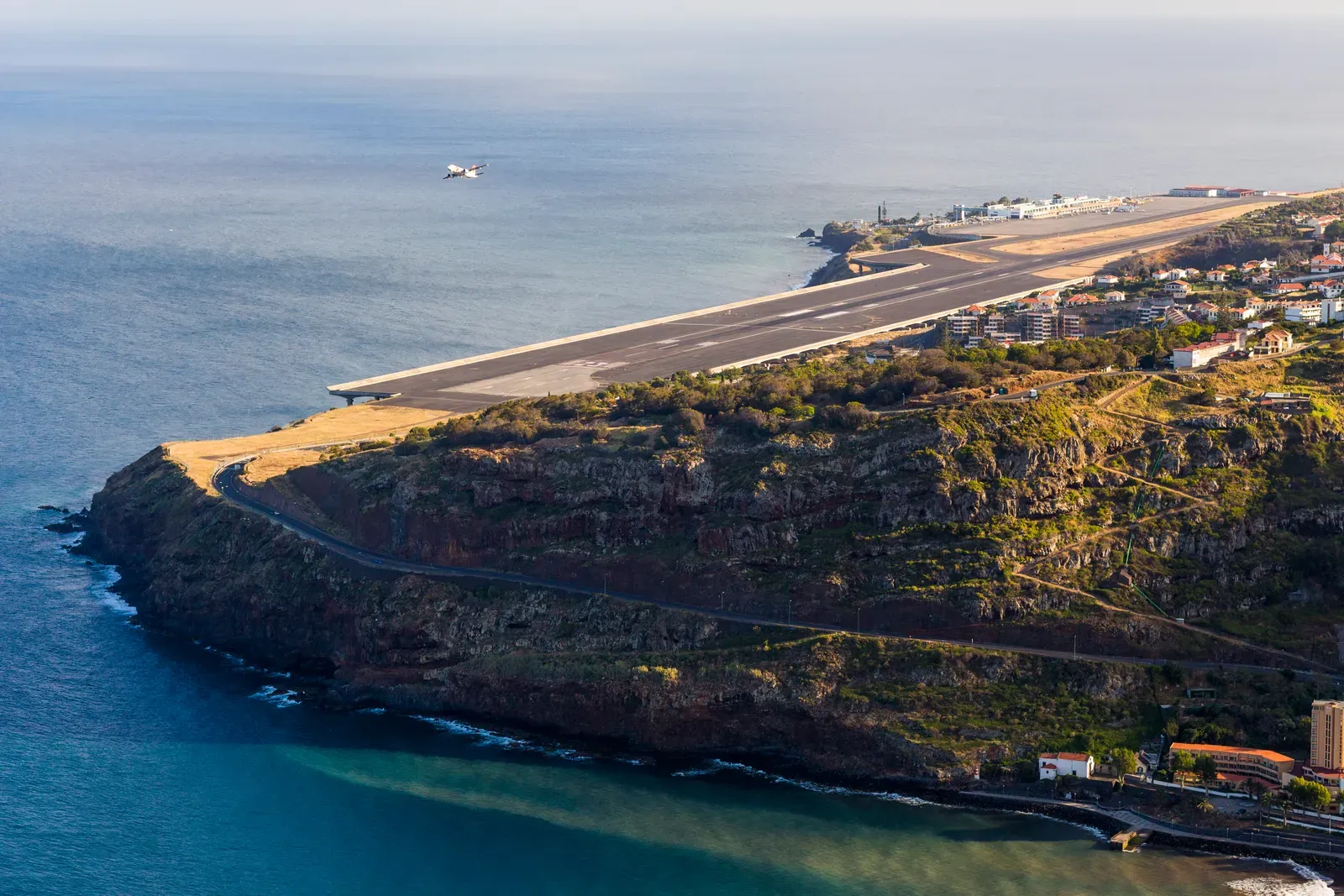 Image may contain Road Outdoors Aircraft Airplane Transportation Vehicle Nature Sea and Water