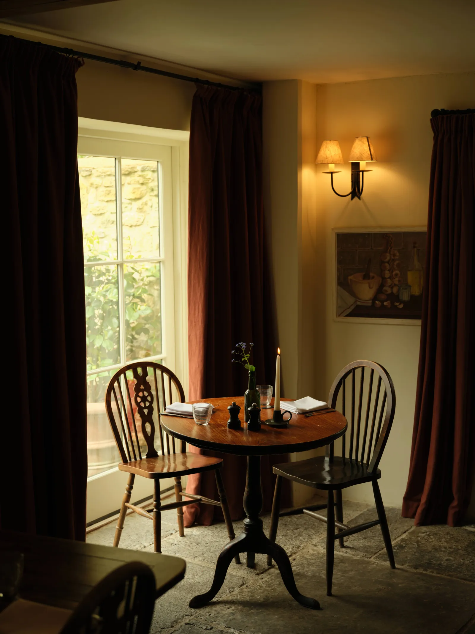 Image may contain Dining Table Furniture Table Architecture Building Dining Room Indoors Room Door and Chair