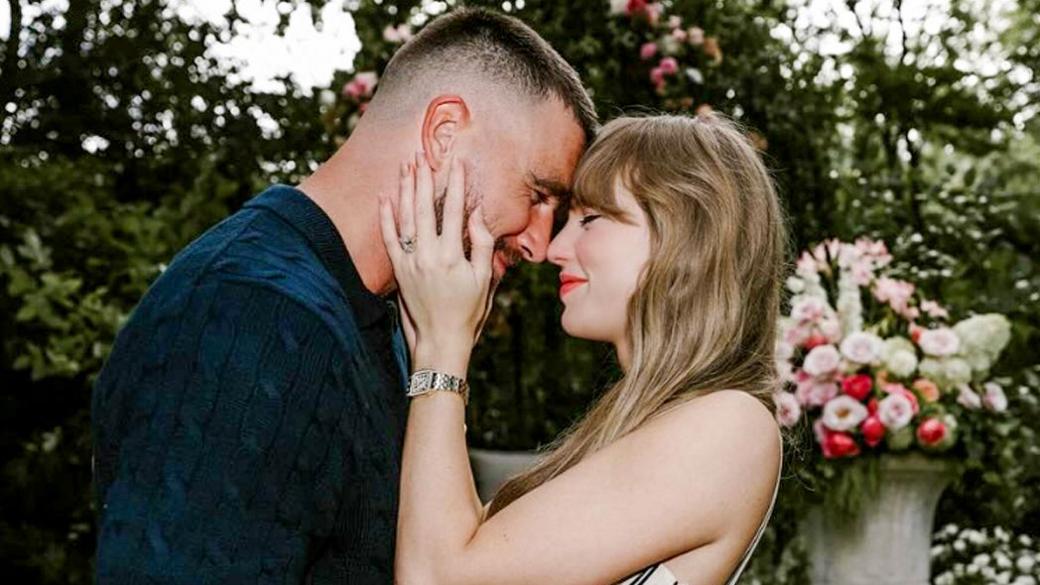 Travis Kelce and Taylor Swift embrace each other on the occassion of their engagement