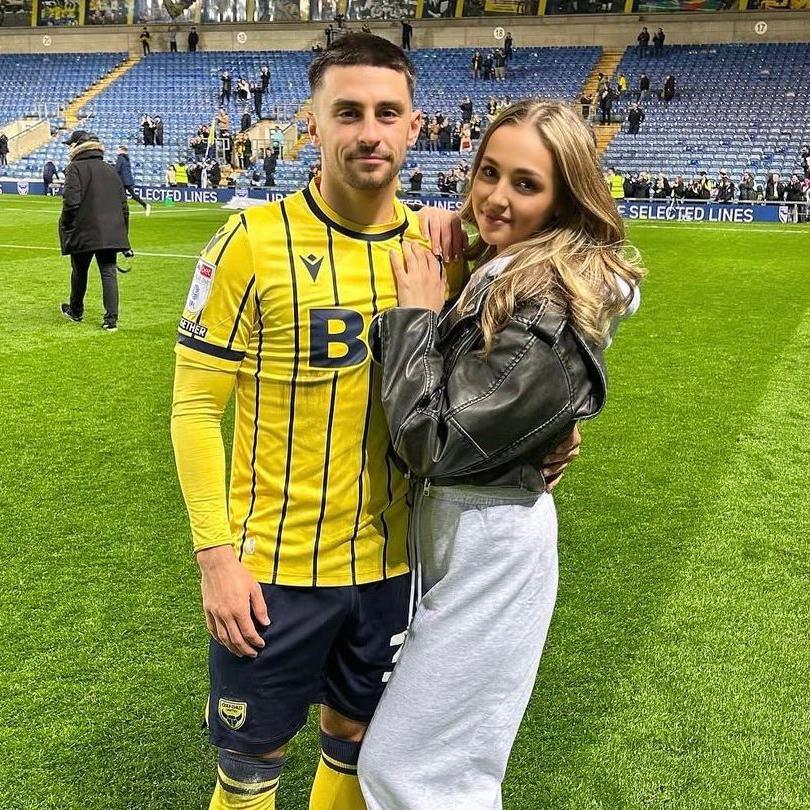 Owen pictured with Jessica after his move to Oxford United in 2024