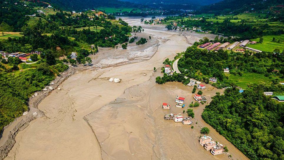Aerial view shows flood-damaged areas after a flash flood swept through the Bhotekoshi River in Nuwakot, Nepal, on August 26, 2026.