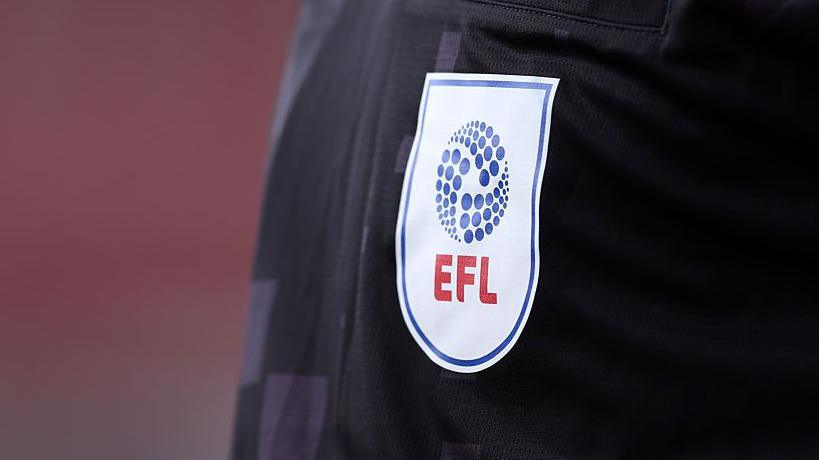 A general view of the EFL logo on the shirt of a linesman