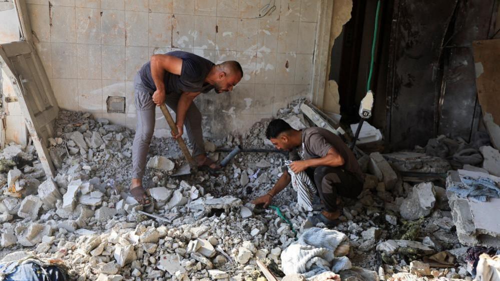 At least 13 killed in Israeli strikes on Gaza after Hamas agree disarmament deal At least 13 killed in Israeli strikes on Gaza after Hamas agree disarmament deal