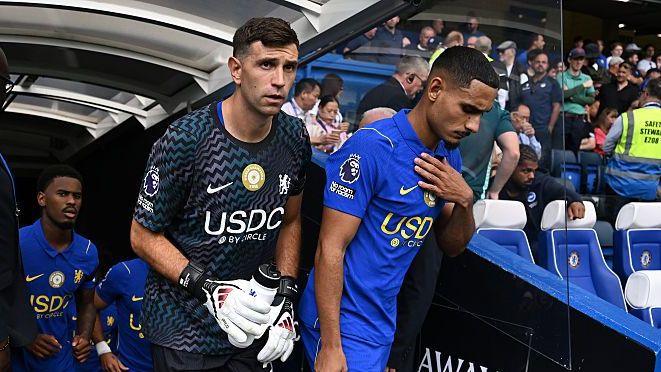 Emiliano Martinez and Maxence Lacroix leaving the Chelsea tunnel