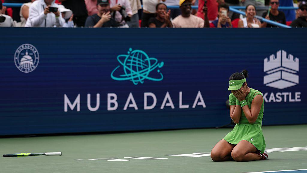Alexandra Eala on the floor in tears