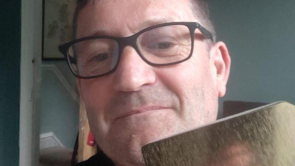 Paul Heaton with his official number one album award for Jenius