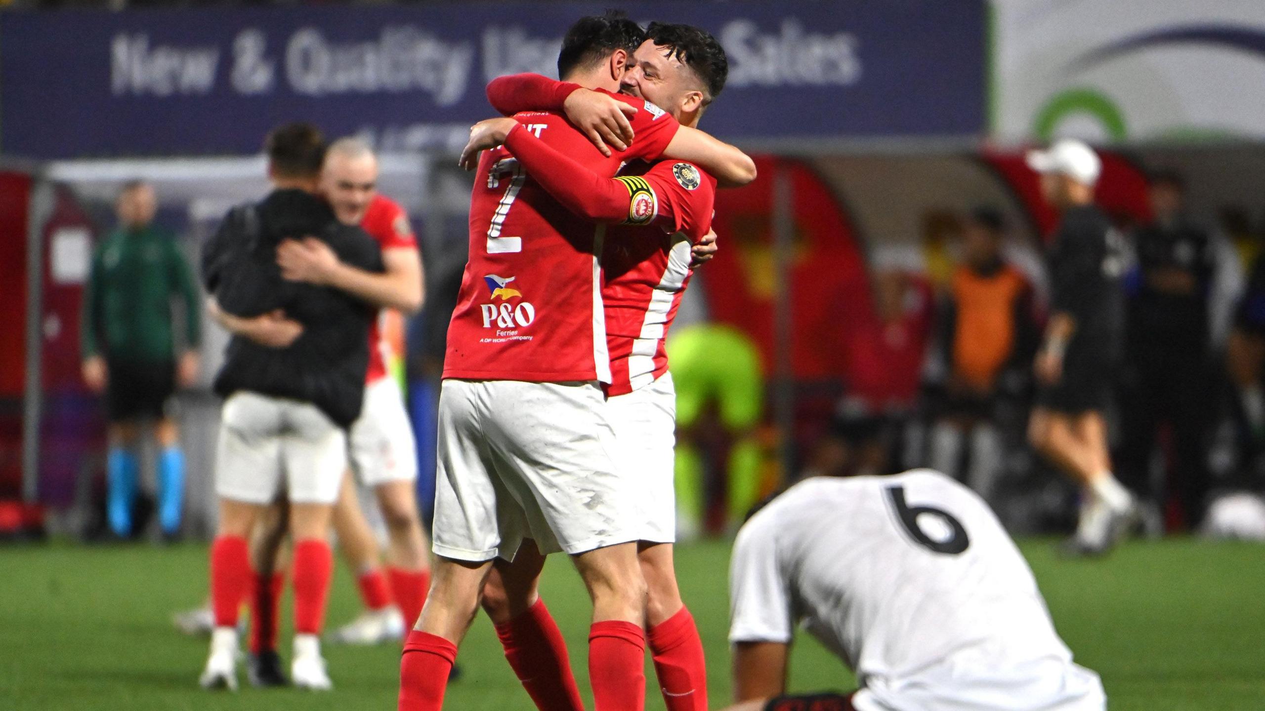 Tomas Cosgrove celebrates