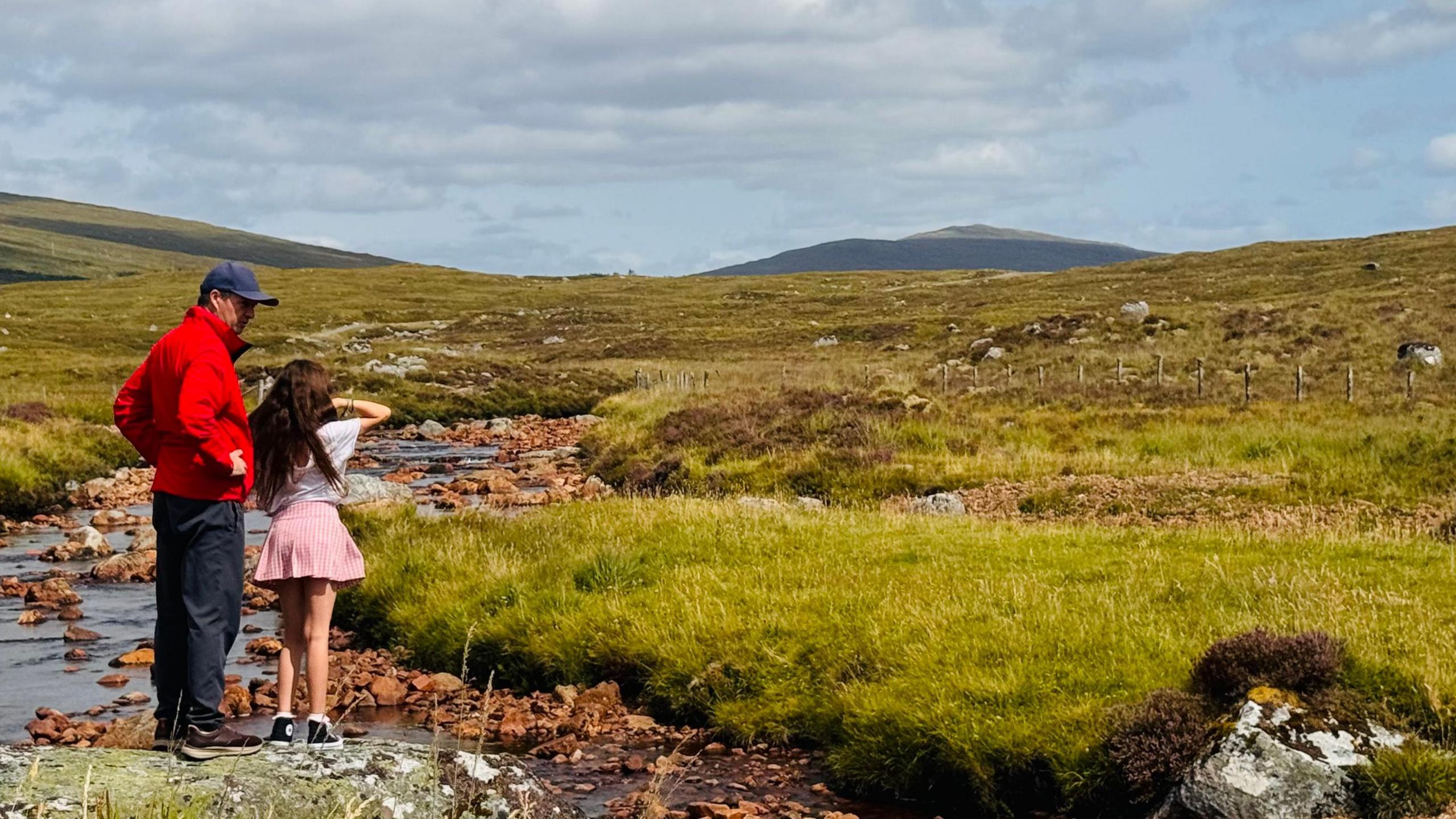 Anna Holligan's brother and her daughter in the Scottish Highlands